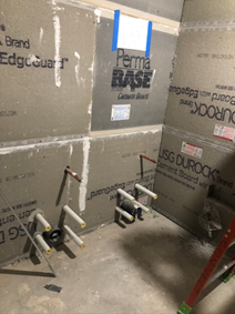 Commercial restrooms during and after renovation