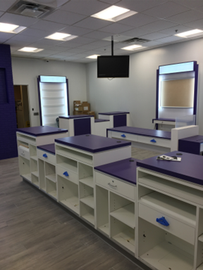Existing retail establishment stayed in business during construction with temporay partitions installed 2